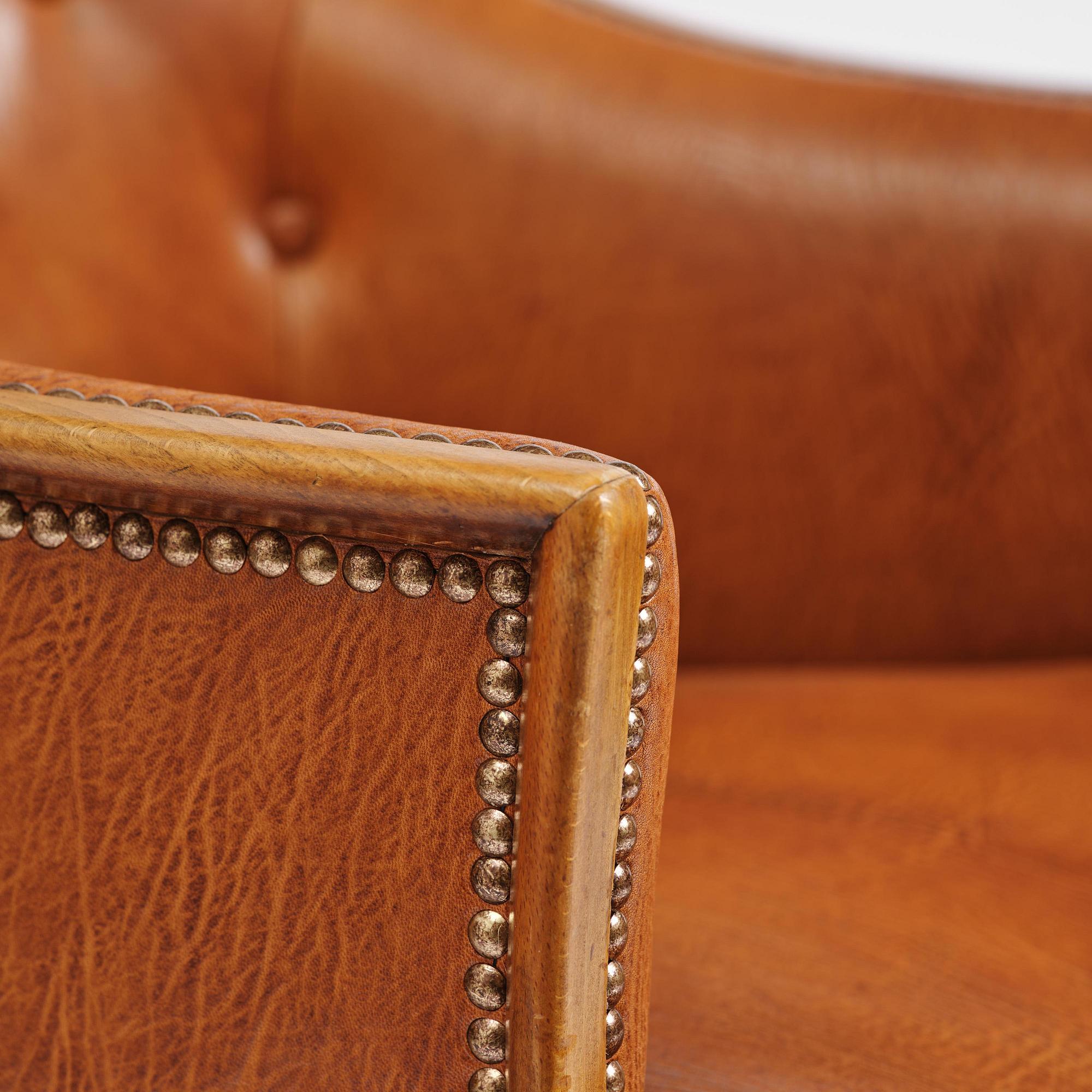 Frits Henningsen, a pair of armchairs, mid-20th century.
