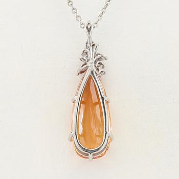 H. Stern, necklace in 18K white gold with a drop-cut orange topaz and diamonds.