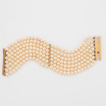 A seven strand cultured pearl Mikimoto bracelet.