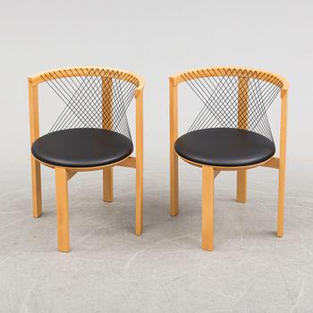 a pair of 'String Chairs' by Niels Jörgen Haugensen, Tranekaer Furniture, Denmark, late 20th century.
