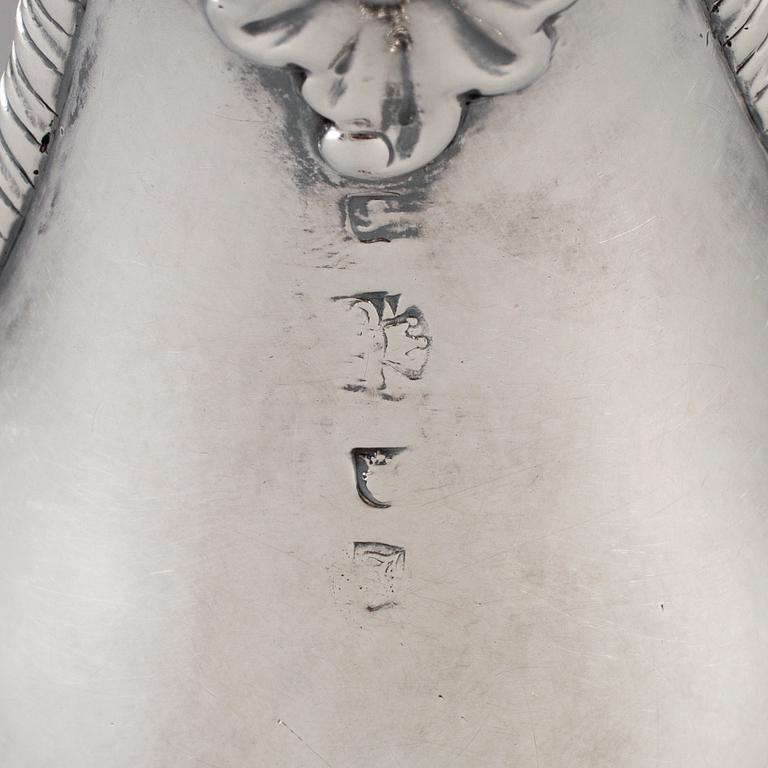 An English 18th century silver sauce-boat, unidentified makers mark, London 1764.
