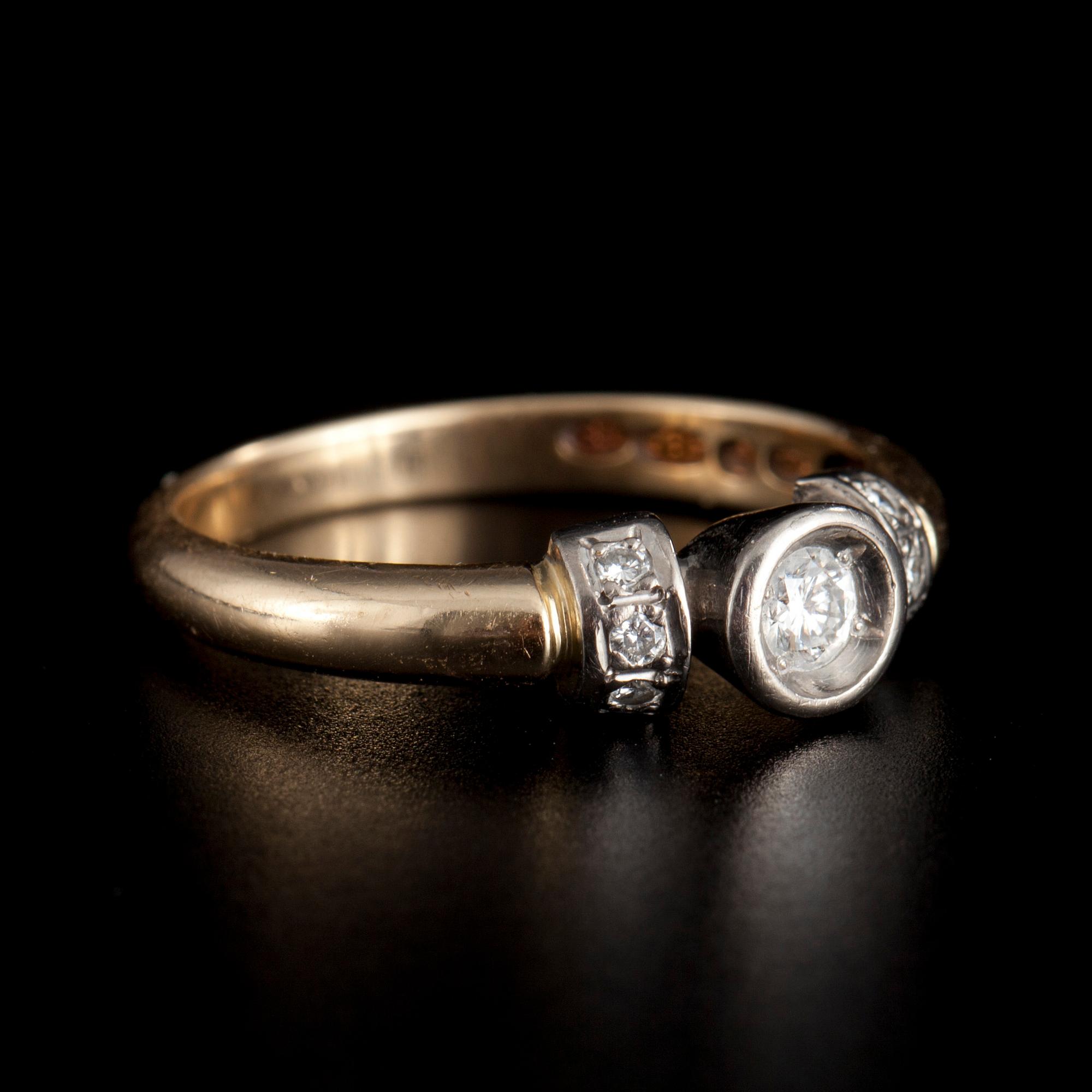 RING, 14K guld/vitguld. Briljantslipade diamanter ca 0.10 ct. Finland 1996. Vikt 3,0 g.