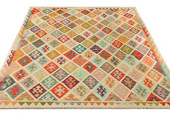 A Kilim carpet, c. 296 x 253 cm.