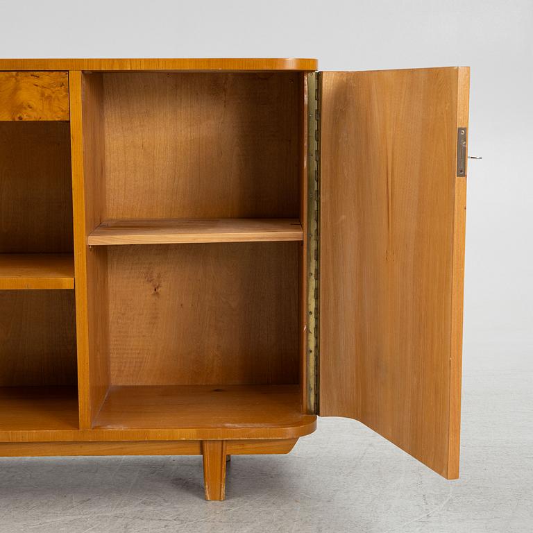 A Swedish Modern bookcase with cabinet, 1940's.