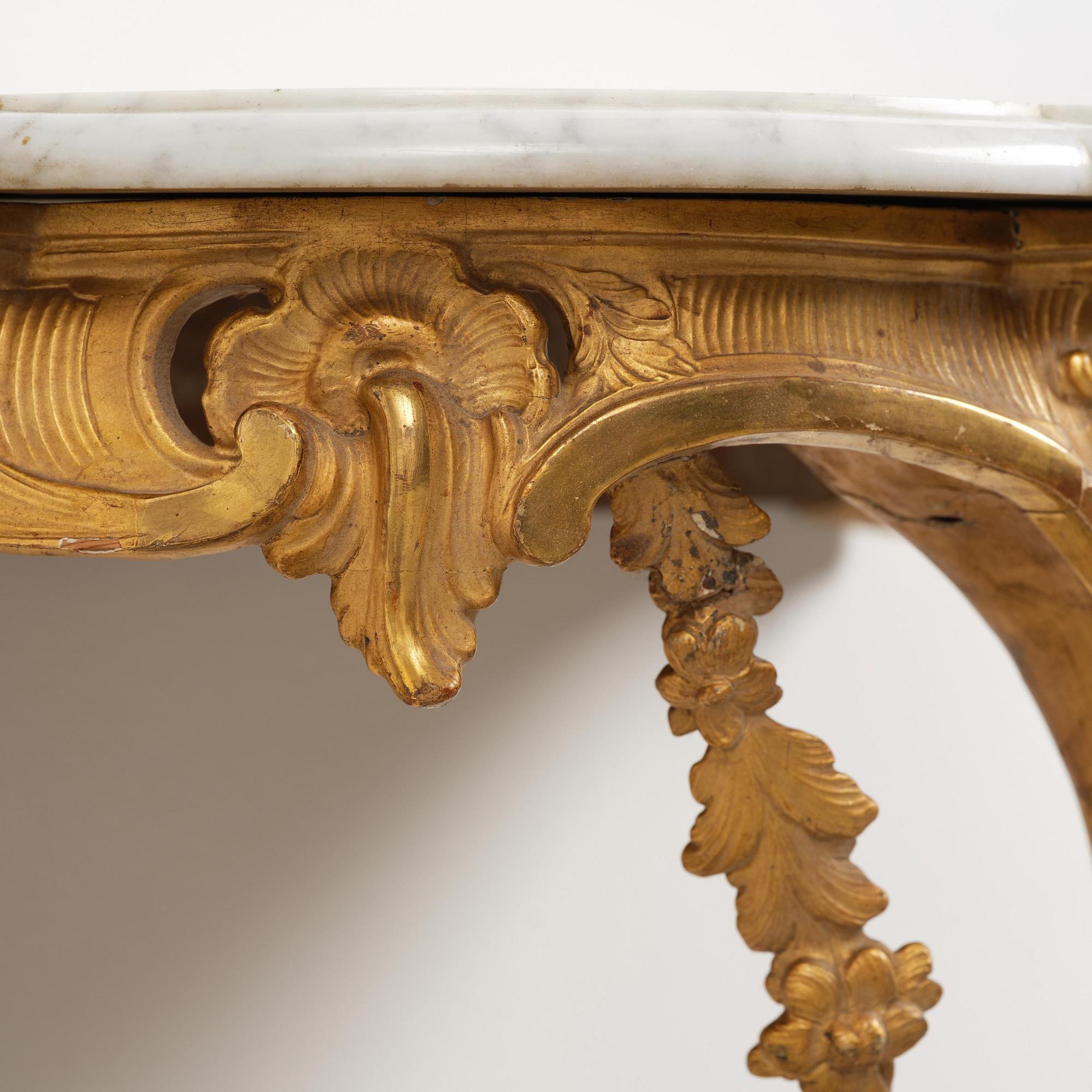 A rococo giltwood and marble console table, Stockholm, later part 18th century.