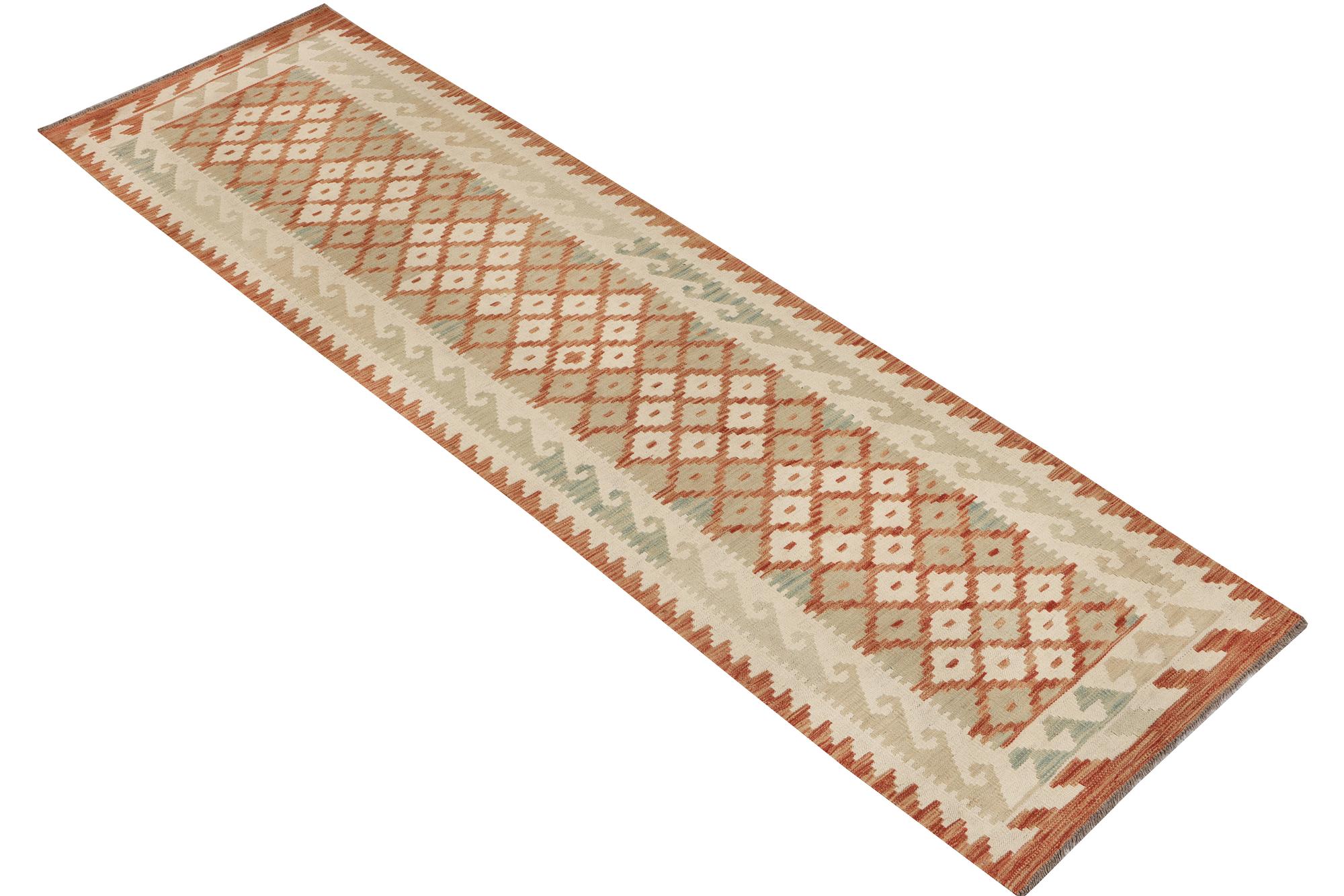 An Afghan kilim runner, c. 296 x 78 cm.