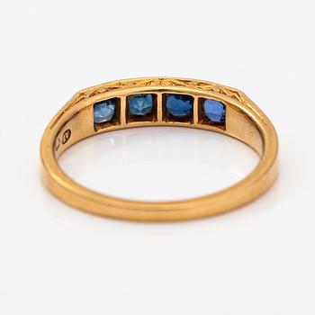 An 18K gold ring with sapphires. Tillander, Helsinki 1947.