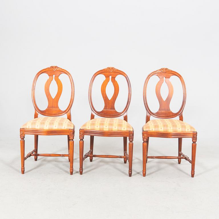 A mid 1900s Gustavian style mahogany 9 pcs dining set.