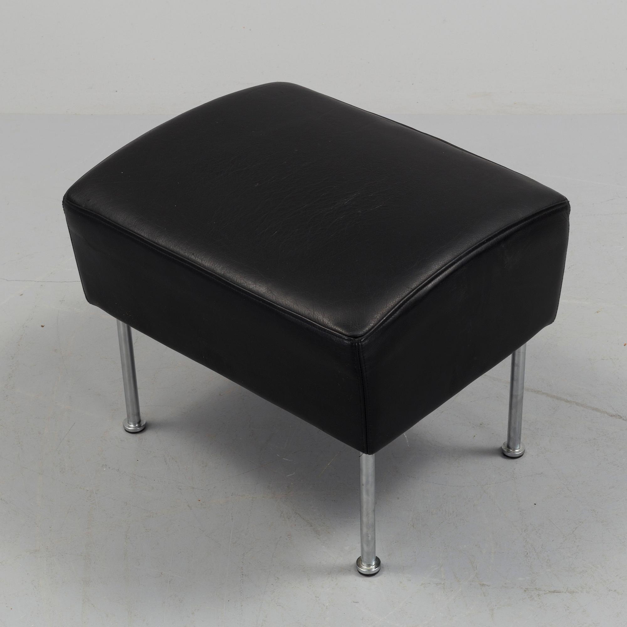 A "Cinema" footstool by Gunilla Allard.