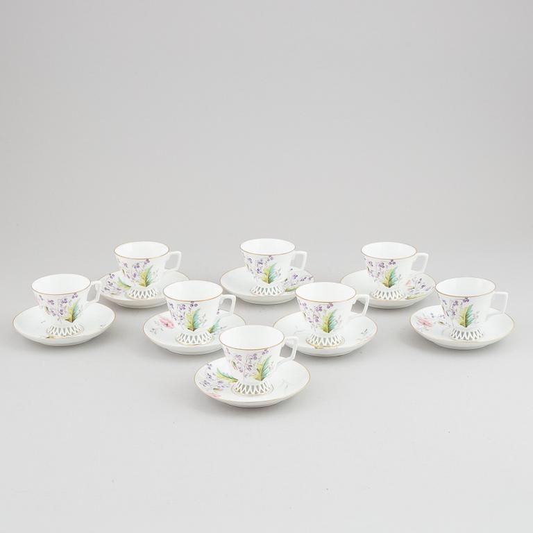 Eight porcelain coffeecups with saucers, Kusnetsov, Russia, around 1900.