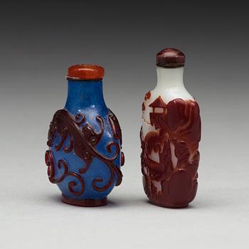 Two Chinese Peking glass snuff bottles, 20th Century.