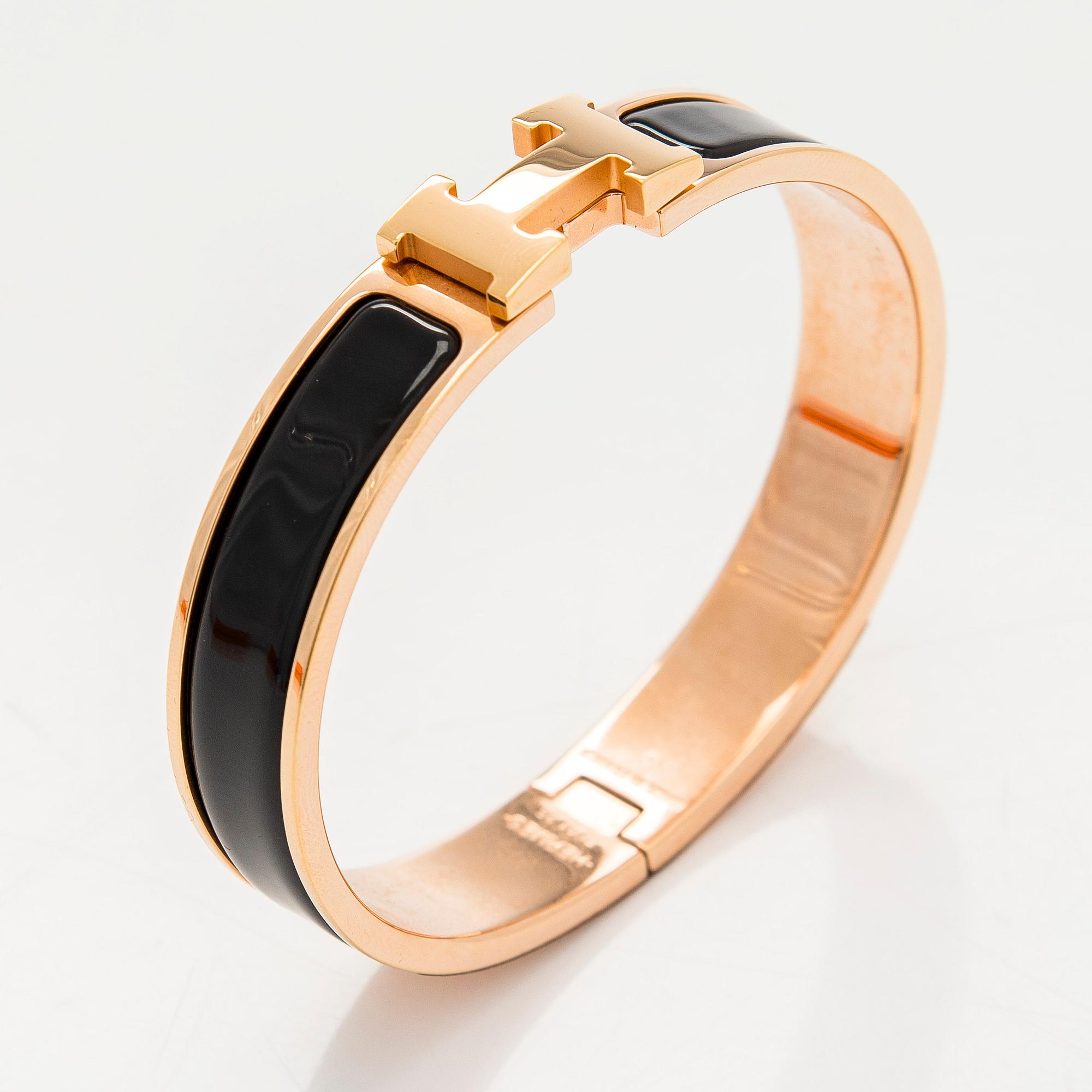 Hermès, a 'Clic H' bracelet.