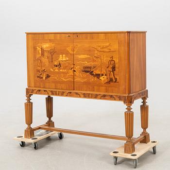 Erik Matsson, cabinet, Mjölby Intarsia for AB Harry Carlsson Stockholm, signed and dated 1944.
