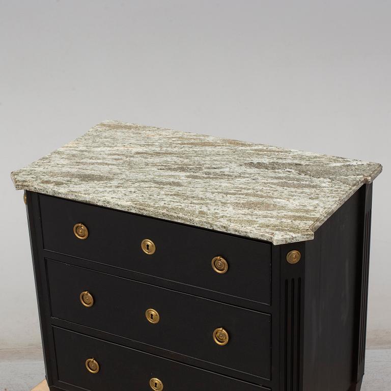 a gustavian style chest of drawers from the early 20th century.