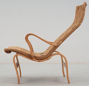 A Bruno Mathsson beech and canvas easy chair, Karl Mathsson, Värnamo, Sweden 1940's.