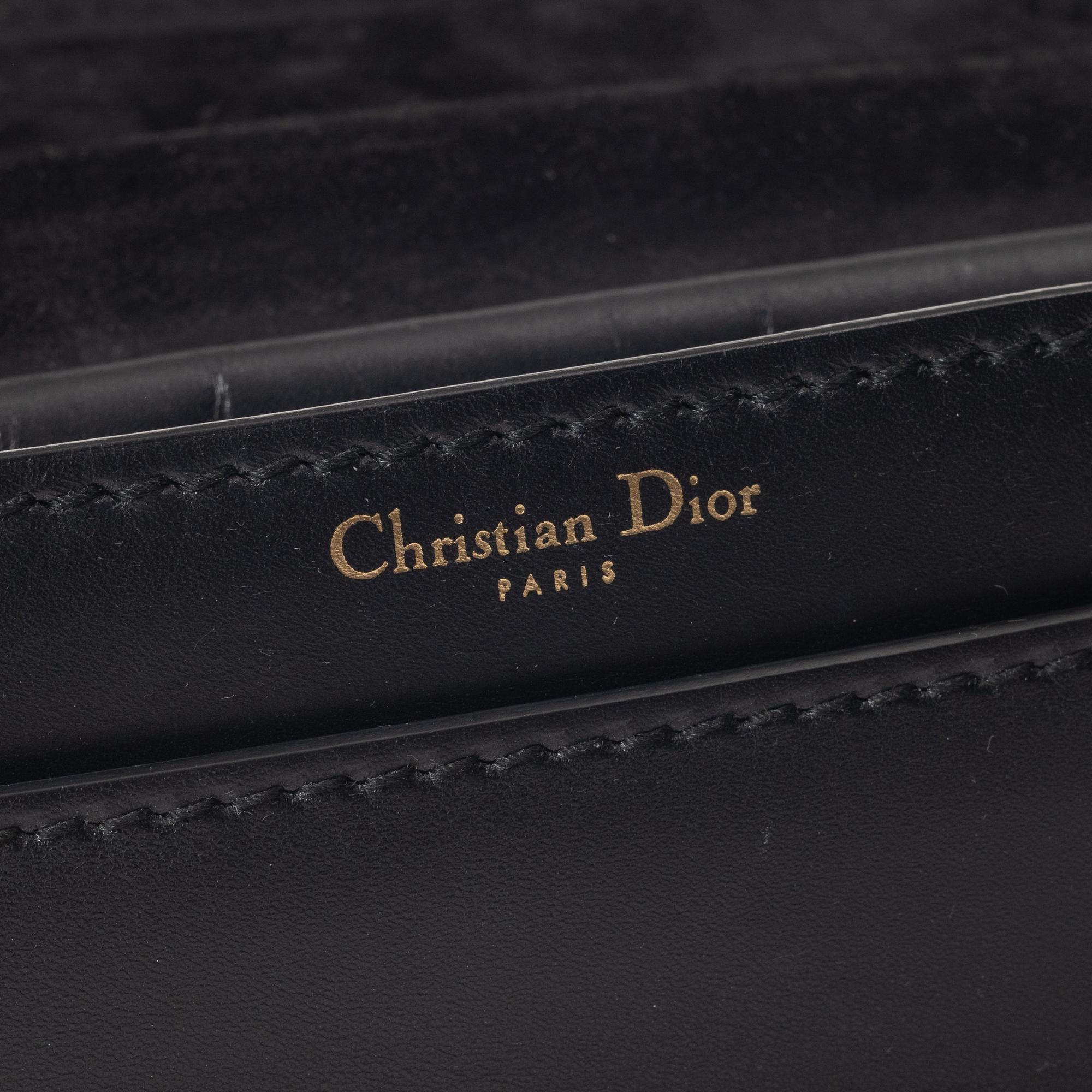 Christian Dior, A black leather "Dio(r)evolution" bag.