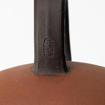 A group of four Chinese yixing teapots, 1970/80s.