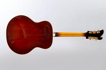 A Crafton Rex acoustic guitar.