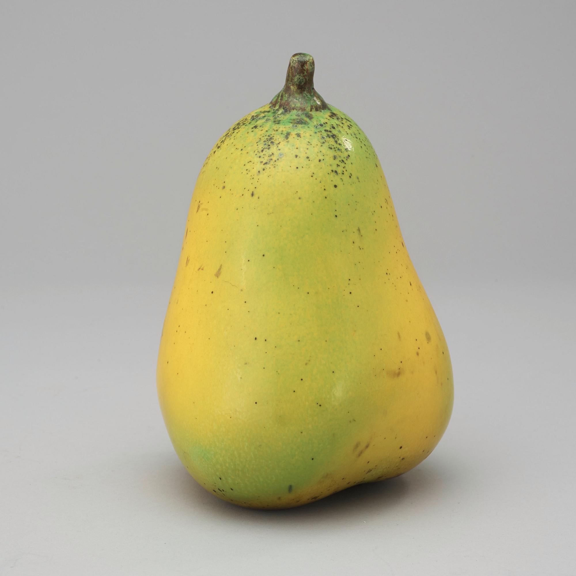 A Hans Hedberg faience sculpture of a pear, Biot, France.