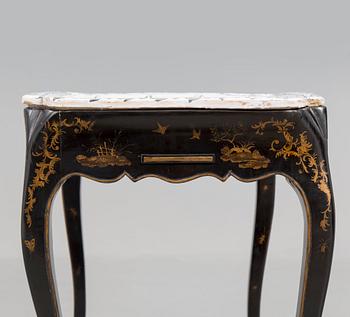 A Swedish Rococo faience tea table, Marieberg 1770.