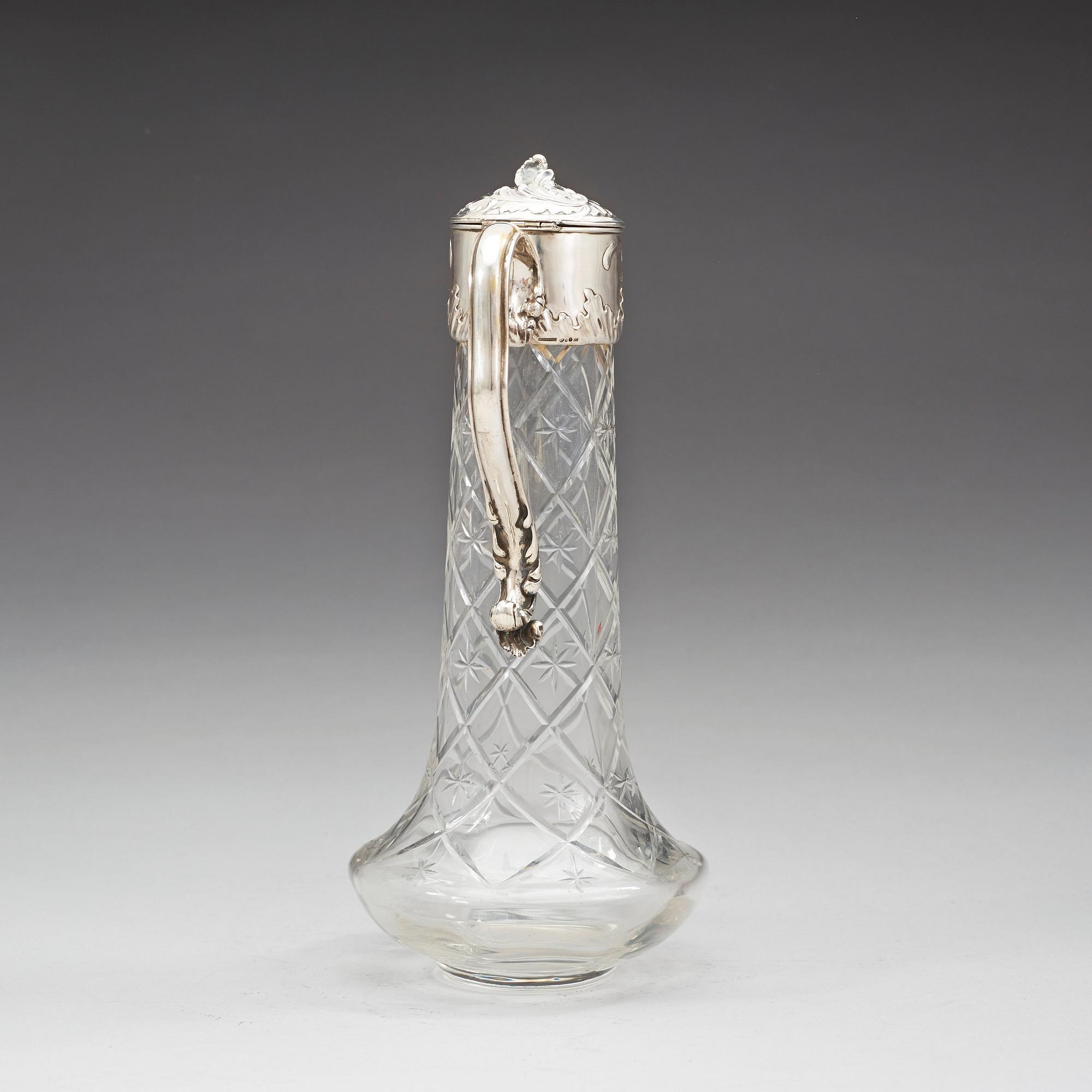 A Swedish 20th century parcel-gilt and cut glass decanter, marks of W.A. Bolin, Stockholm possibly 1918.