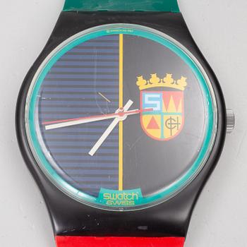 Wall clock, Swatch.