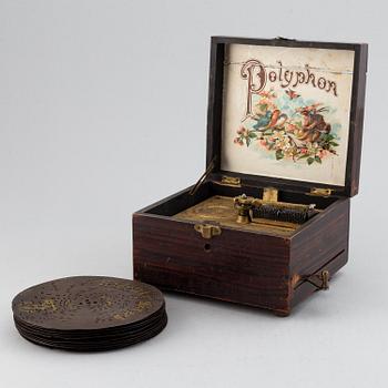 Polyphon wooden music box with ten discs, Germany, c. 1900.