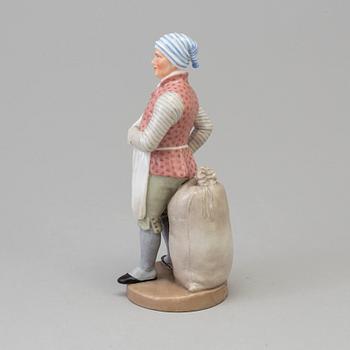 A Bing & Gröndahl figure of a miller, Denmark, 1894.