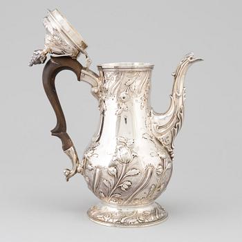An English 18 th century silver coffee-pot, mark of Benjamin Gignac, London 1763.