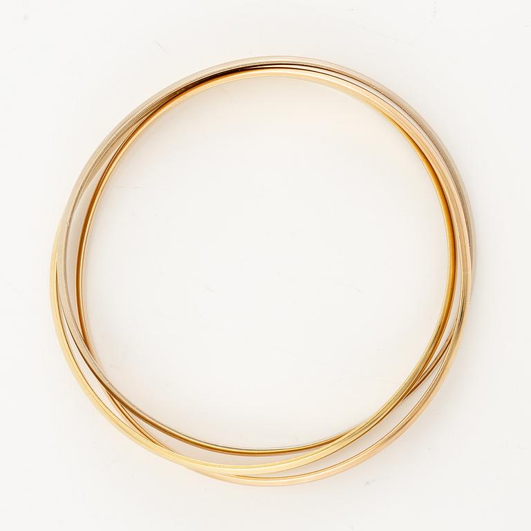 A Cartier bracelet "Trinity" 18K gold in three colours.