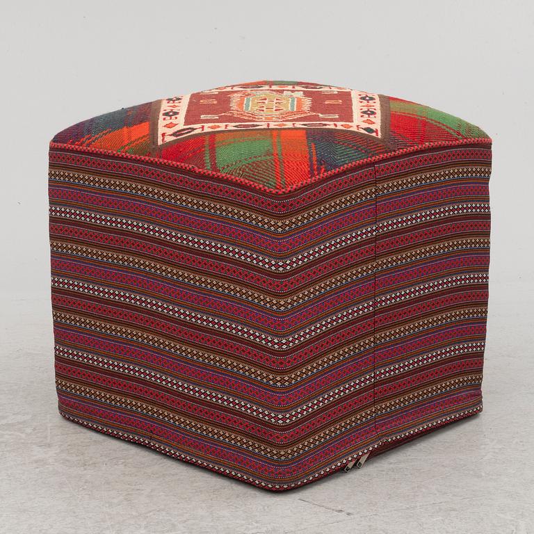 A footstool, kelim, contemporary.