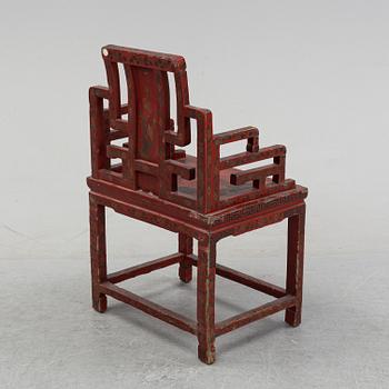 A chinese laqcuer armchair, 20th century.