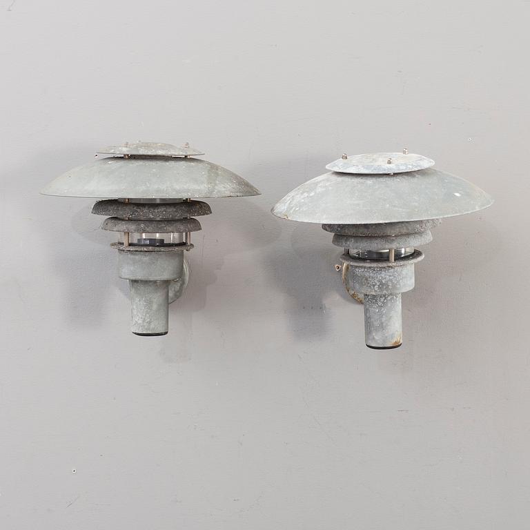 A pair of late 20th century outdoor lights.