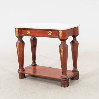 An empire style console table first half of the 20th century.