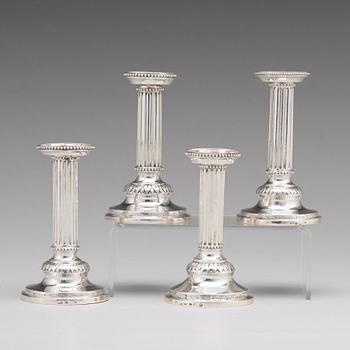 A matched set of four Gustavian silver candlesticks,