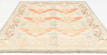 A west Persian carpet of 'Arts and Crafts design', c. 342 x 247 cm.