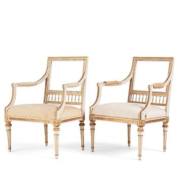 59. A pair of Gustavian open armchairs by J. Lindgren (master in Stockholm 1770-1800).