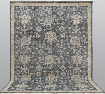 A oriental carpet, ca 373 x 269 cm.
