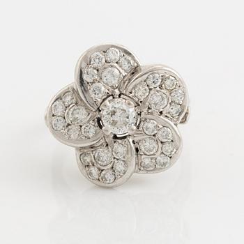 White gold and brilliant cut diamond flower ring.