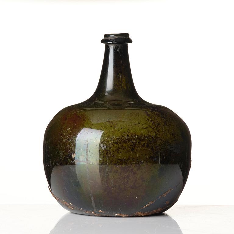 A large armorial wine bottle, Skånska glass manufactory, Henrikstorp, 18th century.