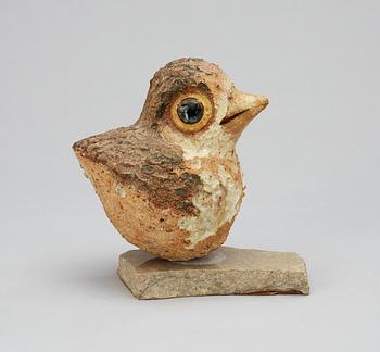 A Tyra Lundgren stoneware figure of a bird.