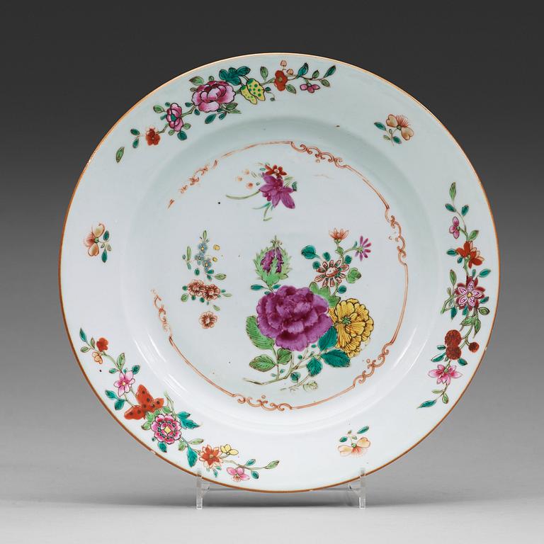 A set of 12 famille rose dinner plates, Qing dynasty, Qianlong (1736-95).