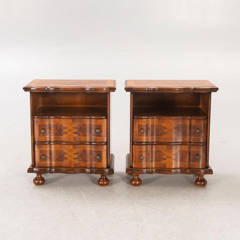 A pair of walnut and mahogany Baroque style b edside tables later part of the 20th century.