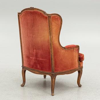 A Rococo style armchair, early 20th Century.