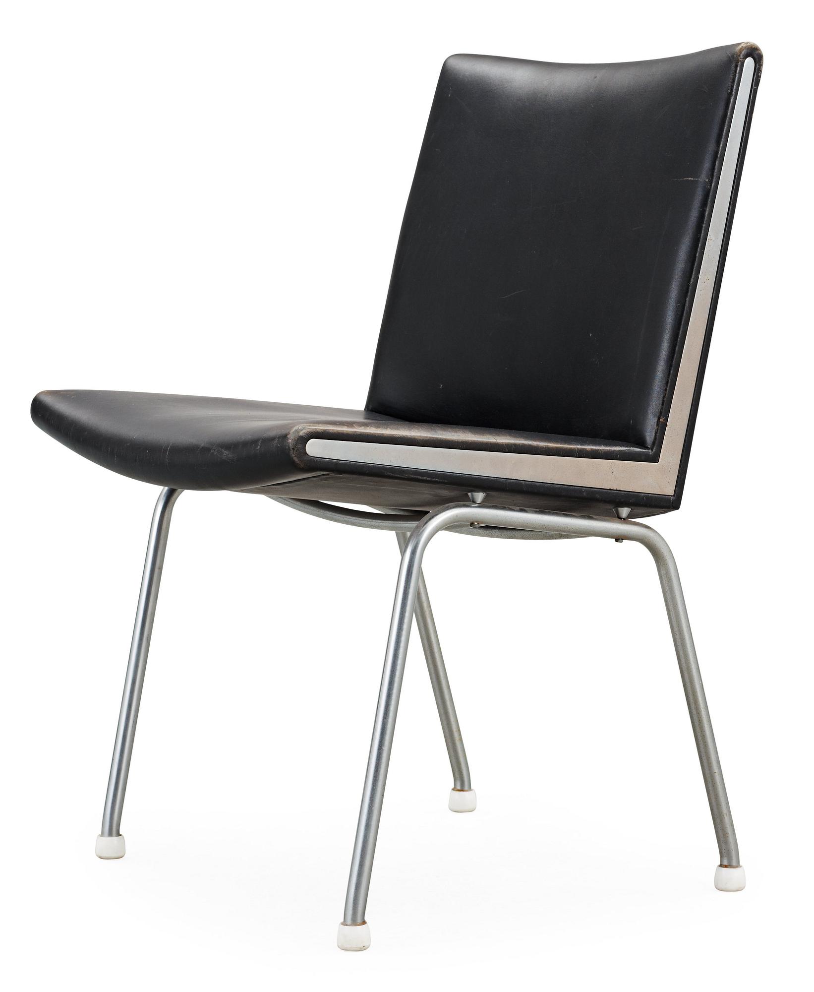 A Hans J Wegner 'Kastrup' steel and black leather chair, AP-stolen, Denmark.