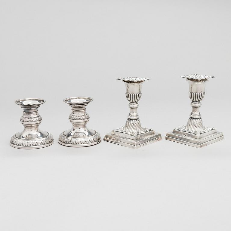 Two pairs of silver candlesticks, England 1889 and Finland 1975.