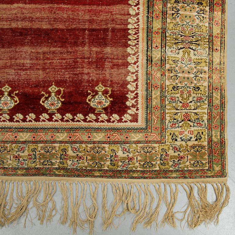 A rug, an antique Anatolia, probably Gördes (Ghiordes), a prayer rug, ca ca 188 x 124 cm.