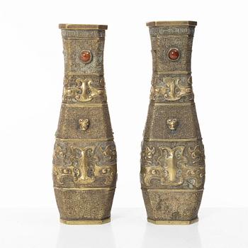 A pair of Chinese gilt bronze vases, Qing dynasty (1644-1912).