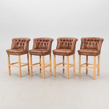 A set of four Milton barstools Lexington 21st century.