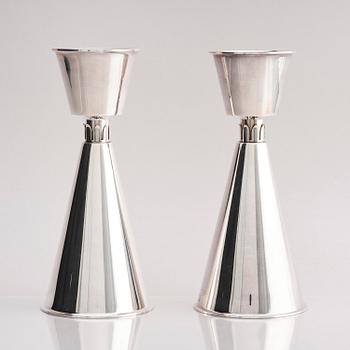Guldsmedsaktiebolaget (GAB), a pair of sterling silver candlesticks, design Vera Ferngren, Stockholm, Sweden 1968.
